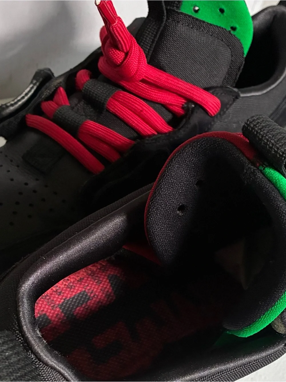 Nike Men’s Black Sneakers with Red Swoosh and Red Laces
